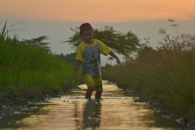 Child play on the river