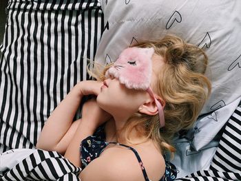 Woman lying down on bed