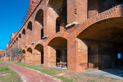 Brick archway of old military fort in florida. large brick construction of fort jefferson