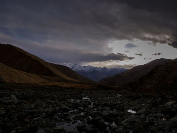 Scenic view of mountains against sky during dusk