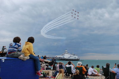 People watching airshow from eastbourne pier