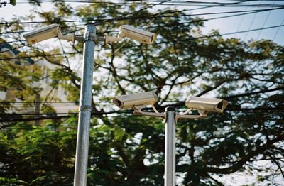 Low angle view of security cameras 