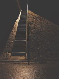 Low angle view of steps at night