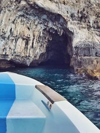 Scenic view of sea seen through cave