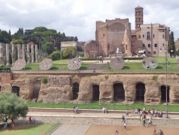 Group of people in front of historical building