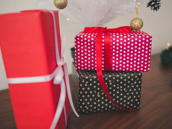 Close-up of christmas presents on table