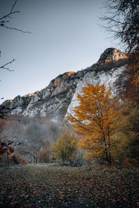 Scenic view of mountains against clear sky during autumn