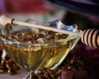 Close-up of bio honey in glass on table