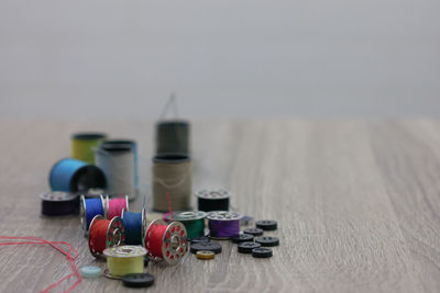 Close-up of sewing kit on table