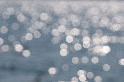 Defocused image of sea against blurred background