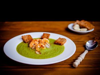 Close-up of food served on table