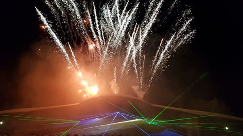 Firework display at night