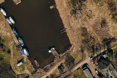 High angle view of people walking on road