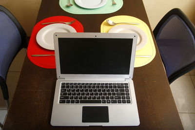 High angle view of laptop on table