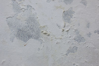 High angle view of footprints on sand at beach