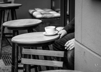 Close-up of two people relaxing on wood