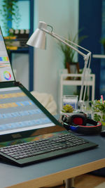 Close-up of laptop on table at home