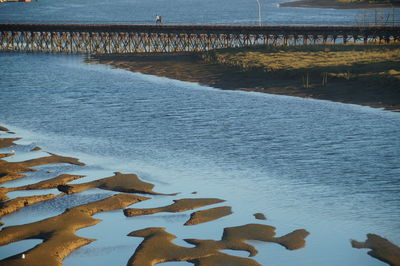 High angle view of pier on beach during winter