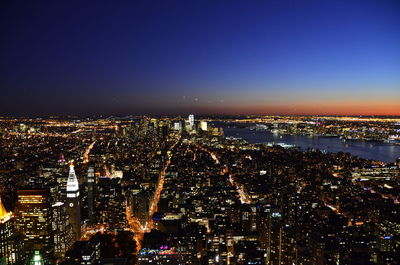 Illuminated cityscape at night