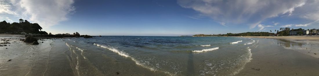 Panoramic view of beach against sky