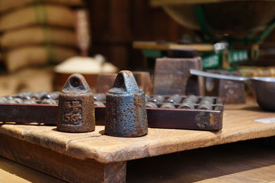 Close-up of old objects on table