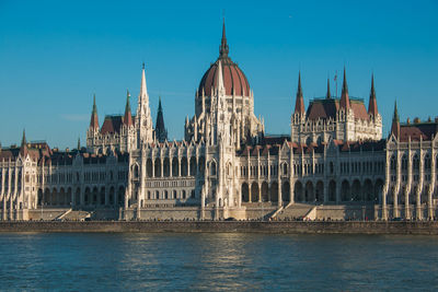 View of the hungarian parliamente in the historic center of budapest over the danube, hungary