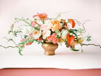 Close-up of vase against white background