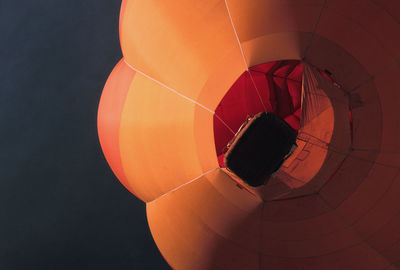 Directly below shot of hot air balloon against sky at night