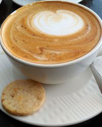 Close-up of cappuccino on table