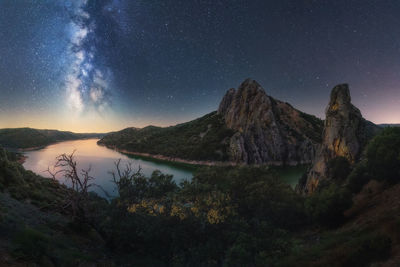 Milky way and stars over the tagus river in the monfrague natural par