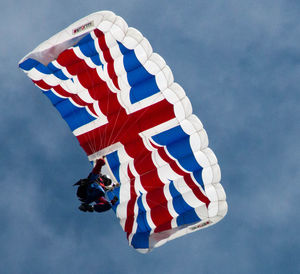 Low angle view of flag against sky