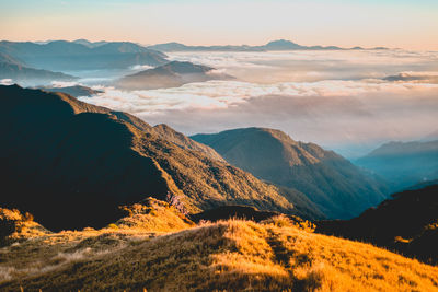 Scenic view of mountains against sky during sunset