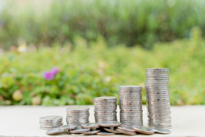 Stack of coins on table