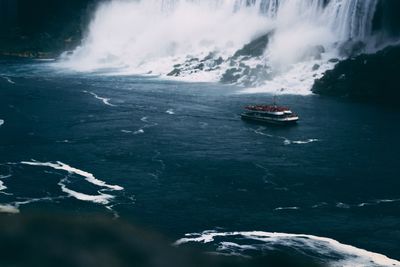 Scenic view of boat sailing in sea