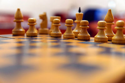 Close-up of chess board on table