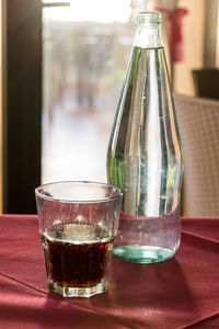 Close-up of beer glass on table in restaurant