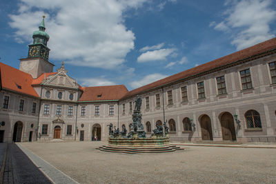 Statue of historic building against sky