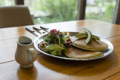 Close-up of food in plate on table