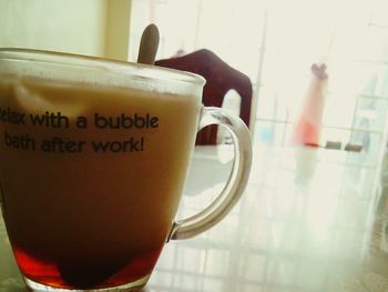 Close-up of coffee cup on table