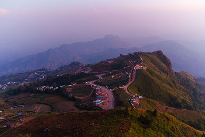 High angle view of mountains against sky during sunset