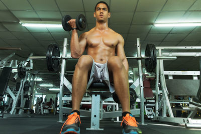 Man exercising in gym