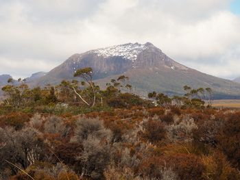 Scenic view of snowcapped mountains against sky