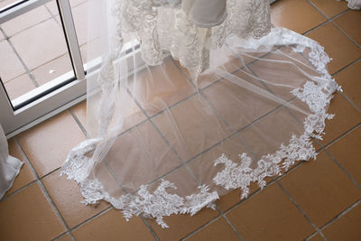 High angle view of people on white floor