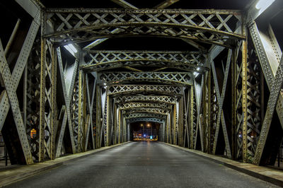 Rear view of empty bridge in tunnel