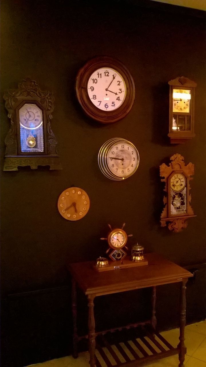 ILLUMINATED CLOCK ON WALL AT HOME