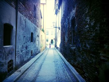 Narrow alley along buildings