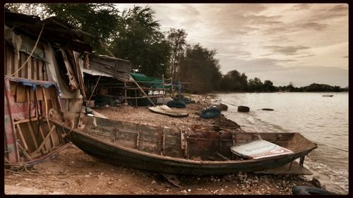 Abandoned boat in sea