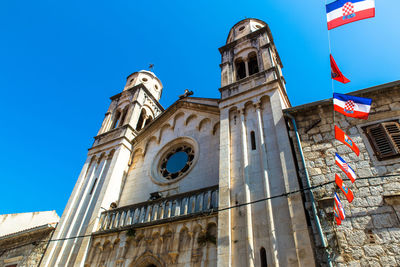 Low angle view of building against blue sky