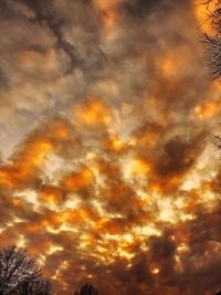 Low angle view of dramatic sky during sunset