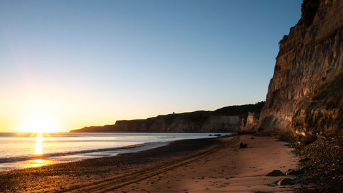 Beautiful beach sunrise ,cape kidnappers located in hawkes bay, north island area of new zealand